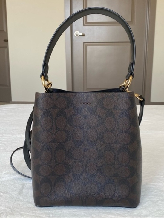 Coach Handbags - Coach Brown Signature Canvas Bucket Shoulder Bag with Black Trim